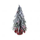 Albero innevato con bacche rosse